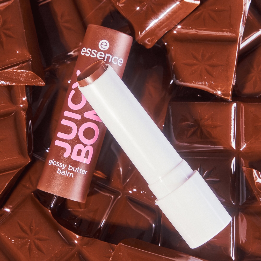 essence JUICY BOMB glossy butter balzam za ustnice